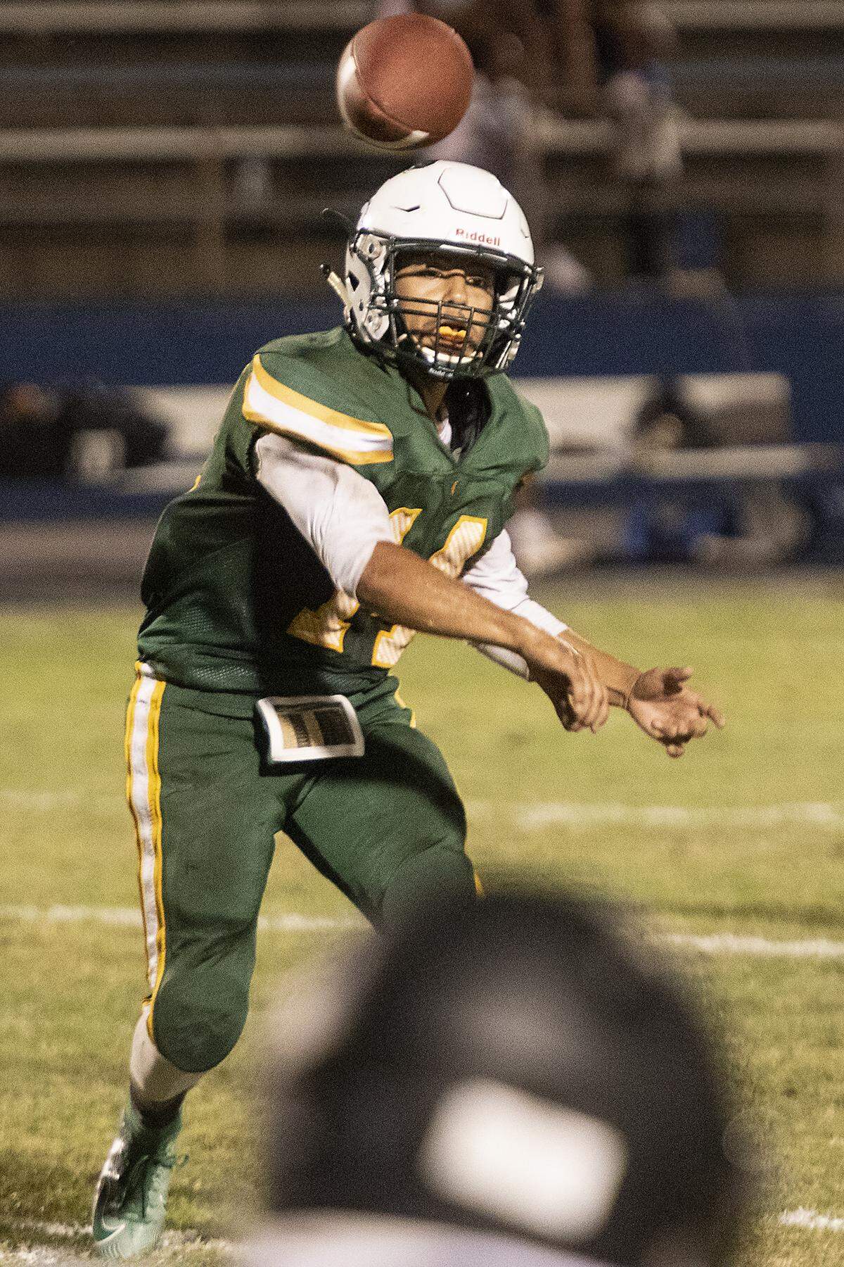 Davis quarterback Elijah Diaz makes a pass during the non-conference game with El Capitan at Modesto Junior College in Modesto, Calif., Friday, Sept. 6, 2019.