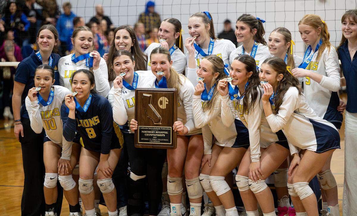 Big Valley Christian players savor victory after the CIF NorCal Regional Division VI Championship match over Faith Christian at Big Valley Christian High School in Modesto, Tuesday, Nov. 18, 2025.