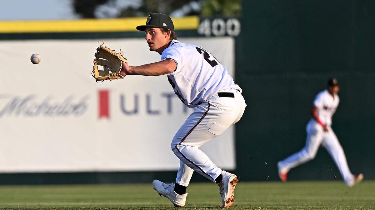 The Modesto Nuts second baseman Cole Young fields a grounder during a game with the Fresno Grizzlies at John Thurman Field in Modesto, Calif., Thursday, June 22, 2023. Fresno won the game 4-3.