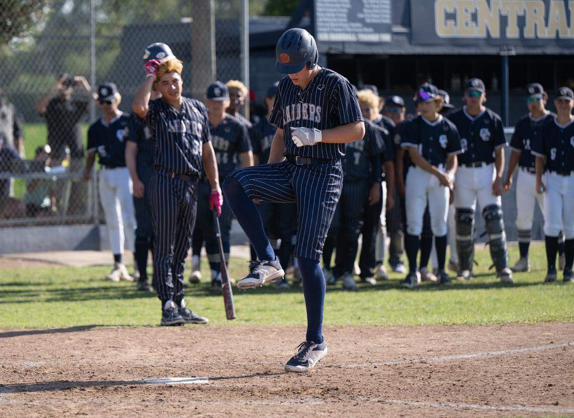 Central Catholic’s TP Wentworth steps on home plate after hitting a solo home run during the Northern California Regional Division III championship game with Oakmont at Central Catholic High School in Modesto, Calif., Saturday, June 3, 2023. Central Catholic won 5-2.