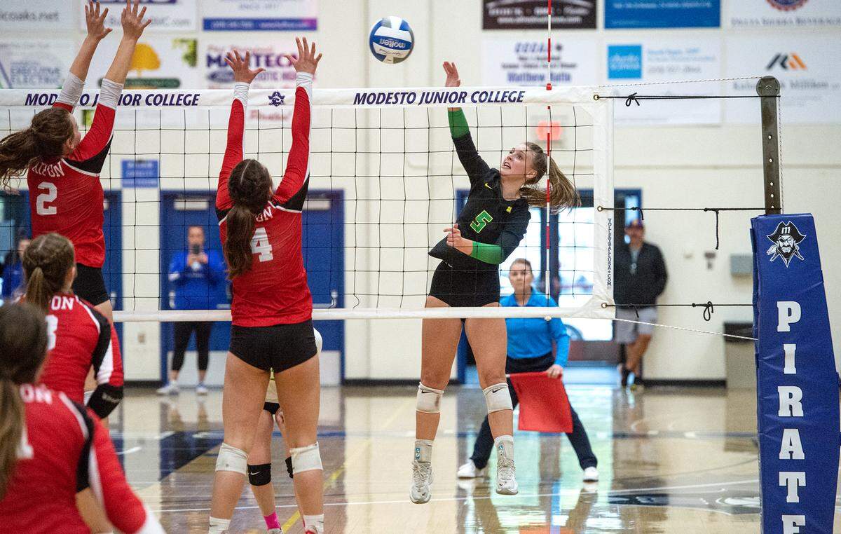 Sonora’s Paige Tipton (5) spikes the ball during the Sac-Joaquin Section Division 4 Section final with Ripon at Modesto Junior College in Modesto, Calif., Saturday, Nov. 5, 2022. Ripon won the title 3-1.