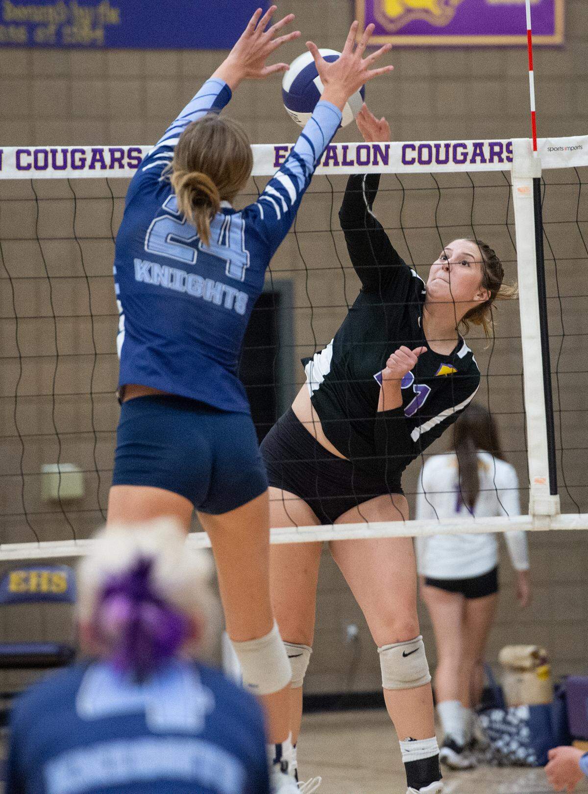 Escalon’s Carsyn Hood drives the ball as Downey’s Kaydence Bispo defends during a non-league match in Escalon, Calif., on Tuesday, September 27, 2022.