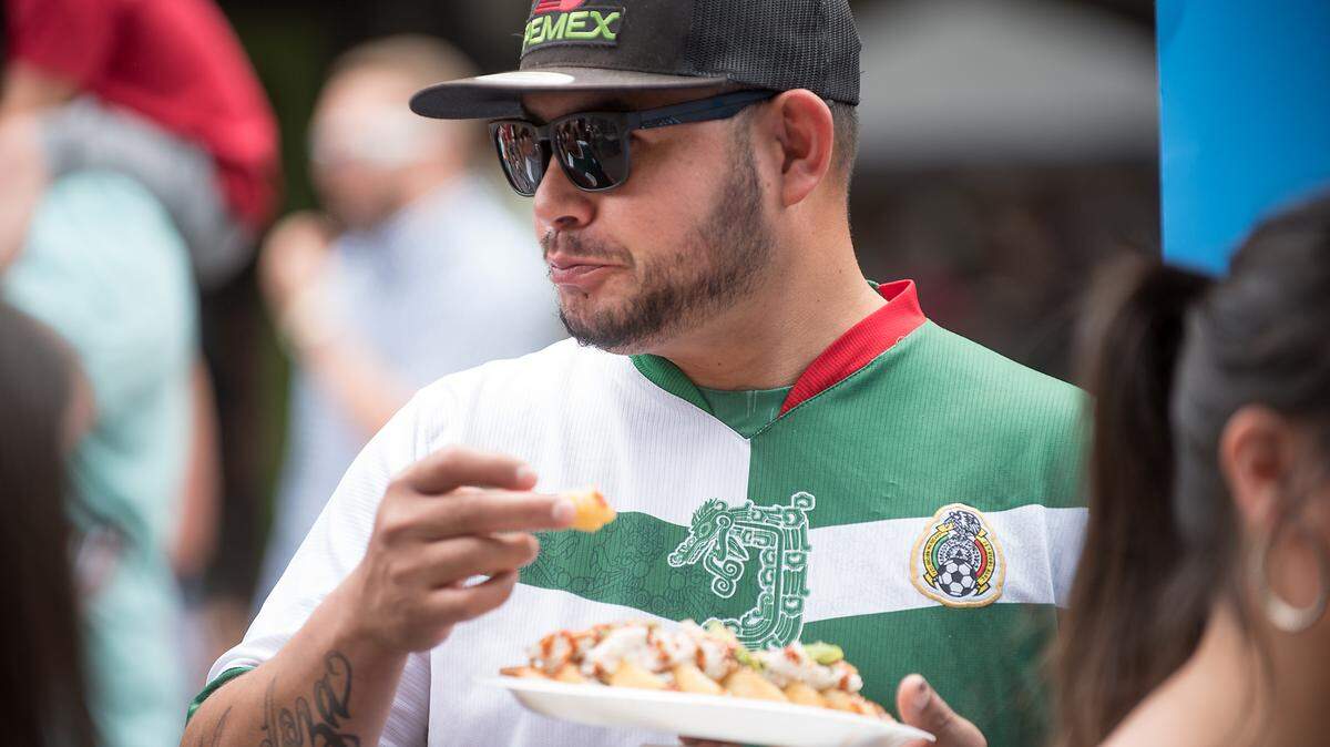 Saul Armaita enjoys food during Modesto Taco Fest in Modesto, Calif., Saturday, May 5, 2018.
