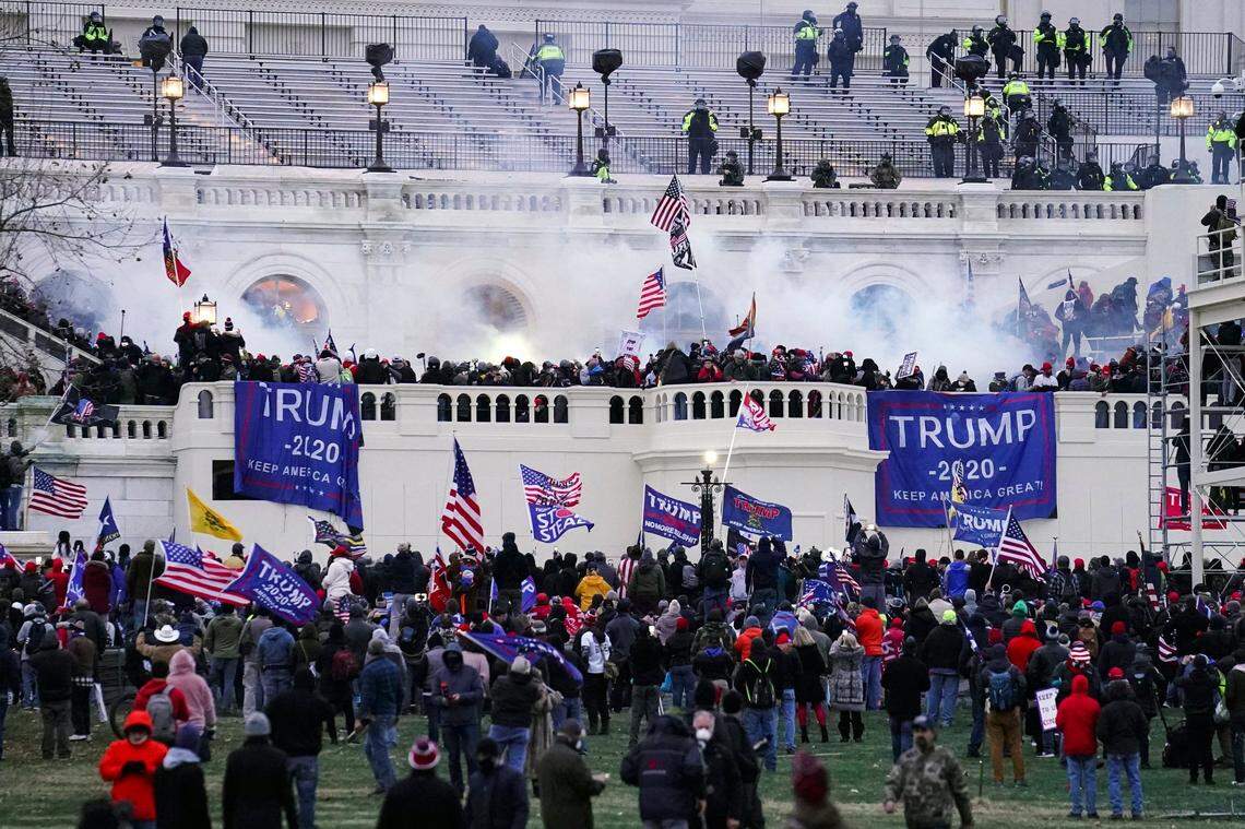 Violent insurrectionists loyal to President Donald Trump storm the Capitol in Washington on Jan. 6, 2021. Former White House aide Cassidy Hutchinson told a congressional committee that Trump knew in advance that the crowd at a Jan. 6 rally was heavily armed.