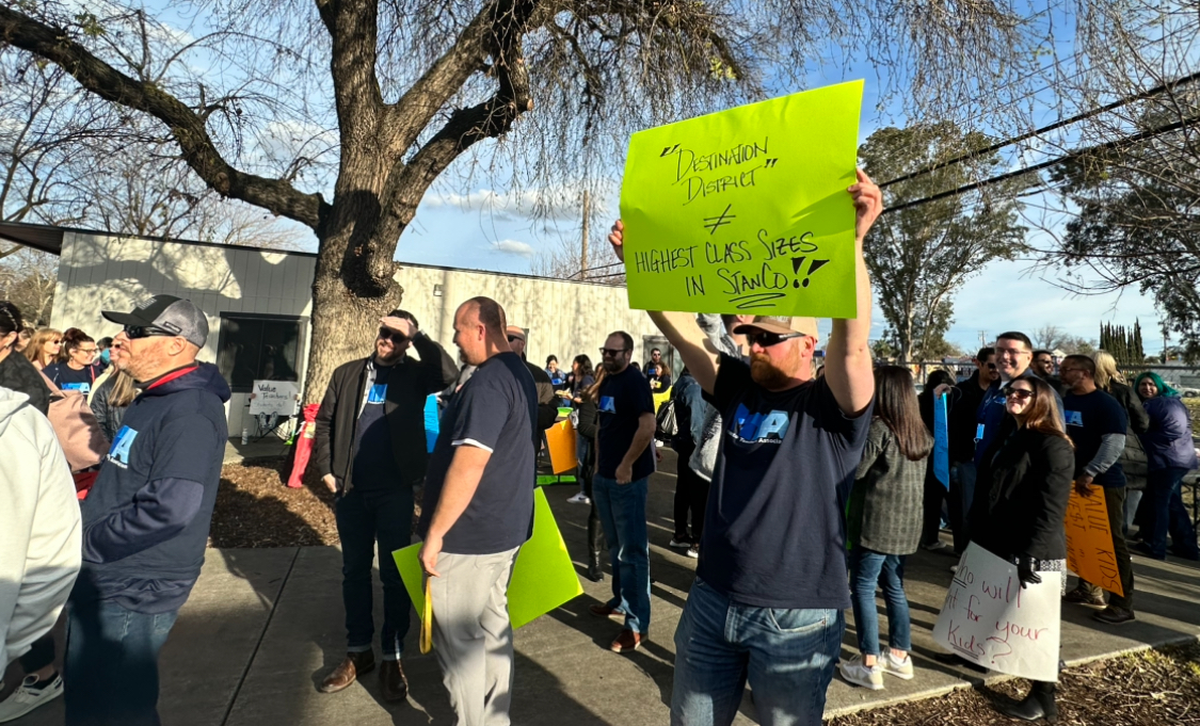 Hundreds of people — teachers and others — picket outside the Modesto City Schools board meeting Monday afternoon, March 4, 2024.