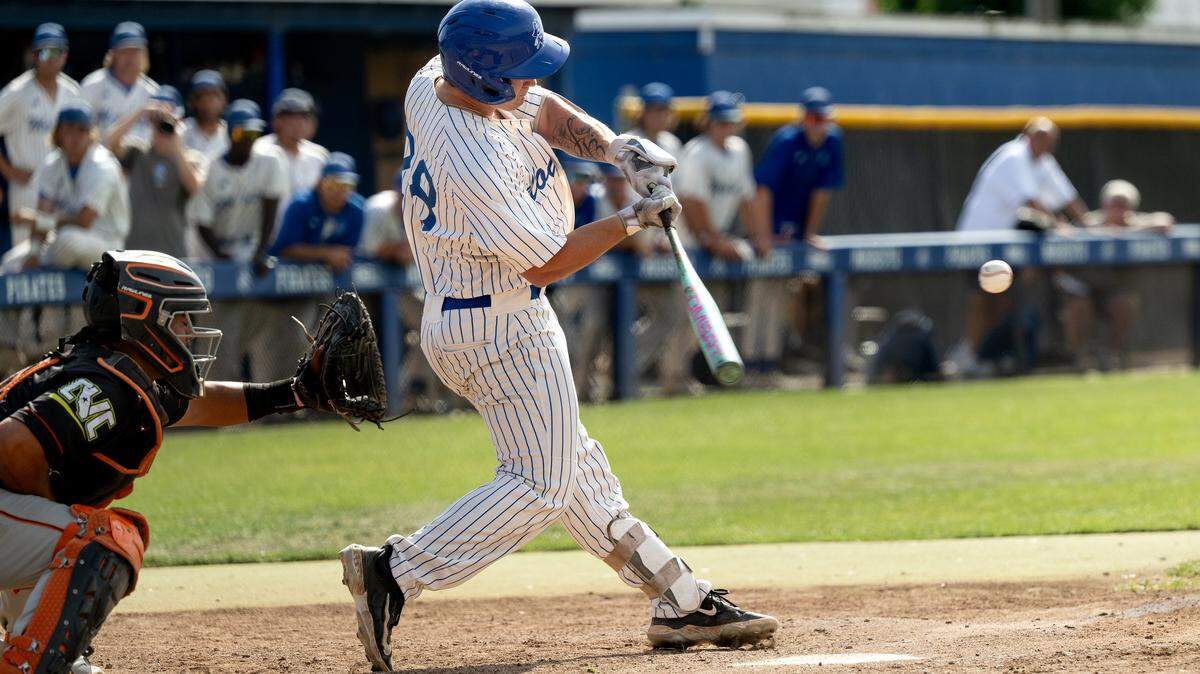 Modesto’s Jedediah Strange-Tregear connects for a base hit as part of the five-run third inning in the Northern California Regional playoff game with Reedley at Modesto Junior College in Modesto, Friday, May 1, 2026. Modesto won the game 6-5.