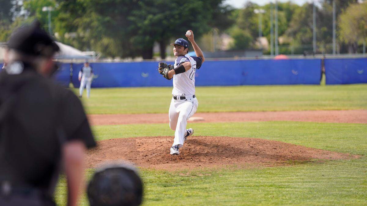 Downey pitcher Ryne Moore delivers a pitch in a CCAL game against Gregori High at Downey High School in Modesto, Calif. on Wednesday, April 16, 2025.