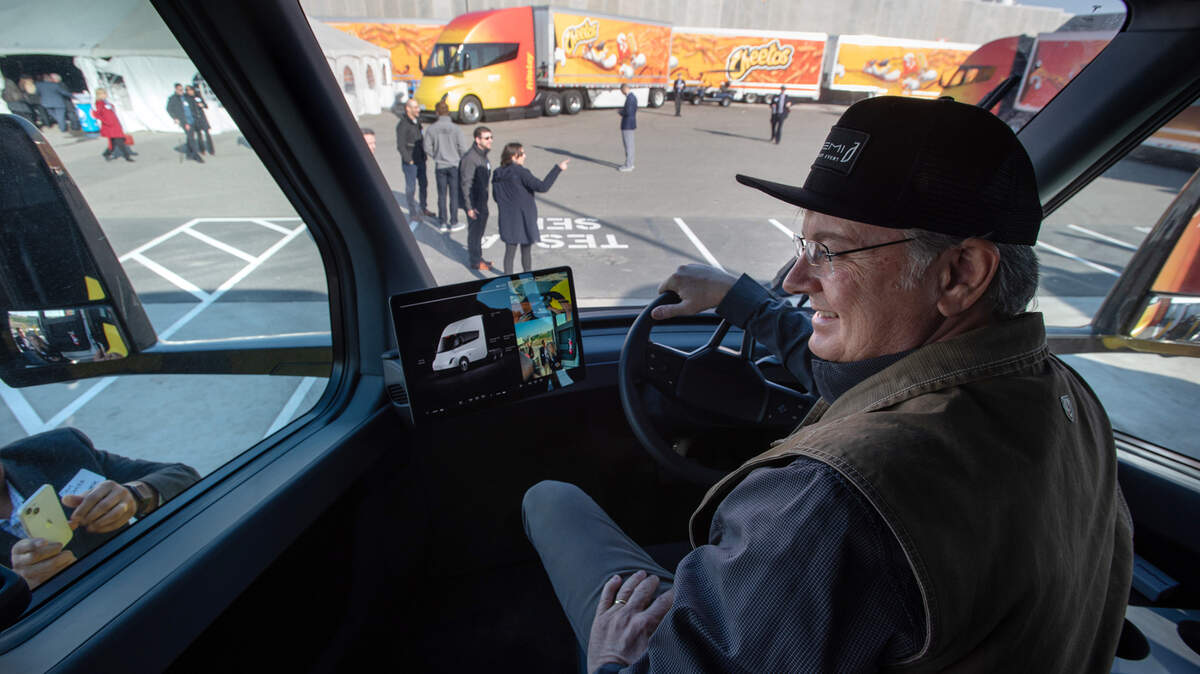 Newly elected congressman John Duarte sits in the driver’s seat of a Tesla semi truck at the Frito-Lay production facility in Modesto, Calif., Wednesday, Jan. 18, 2023. Frito-Lay introduced the Tesla semi trucks and the company’s other zero or near-zero emissions vehicles as part of its sustainability project at their Modesto plant.