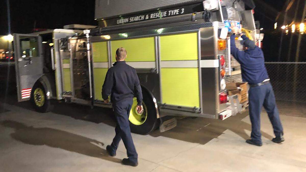 Modesto Fire Department crews, part of Task Force 4819 with a Modesto Fire Captain as the Team Leader, prepare a search and rescue engine on Friday November 9, 2018. The crew is assigned to the Camp Fire in Butte County.