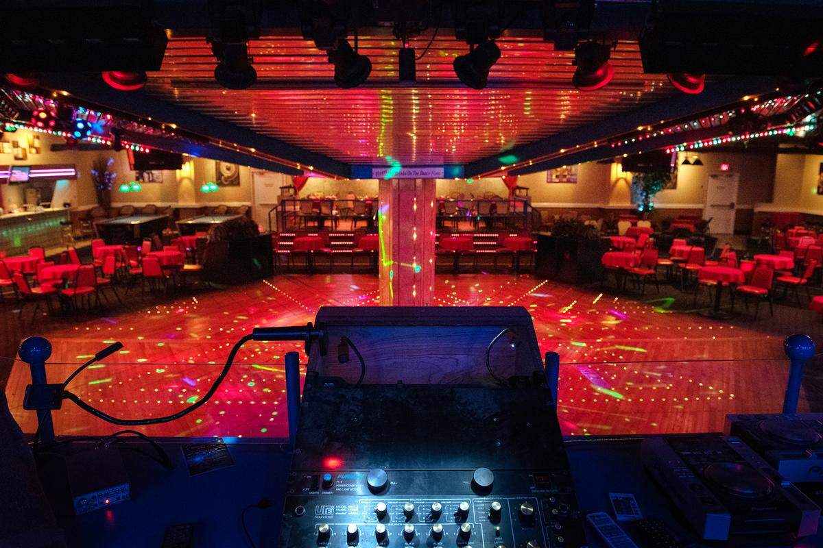 Crocodiles, one of the valley’s first discotheques & longest running nightclubs in Modesto, has changed ownership. The dance floor, seen from the DJ booth, is lit up with colorful lights in Modesto, Calif., on Friday, July 15, 2022.