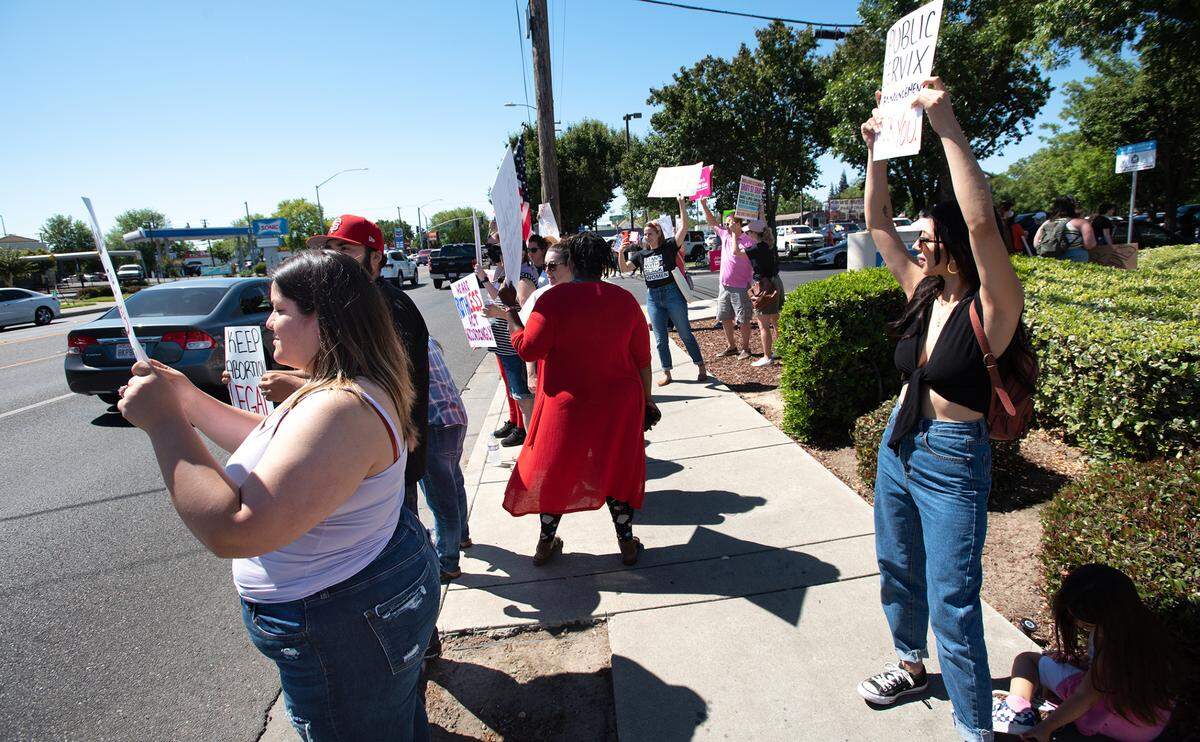 Supporters of abortion rights, including Kate Hagerty, right, rally outside the Planned Parenthood office on McHenry Avenue in Modesto, Calif., on Saturday, May 14, 2022.