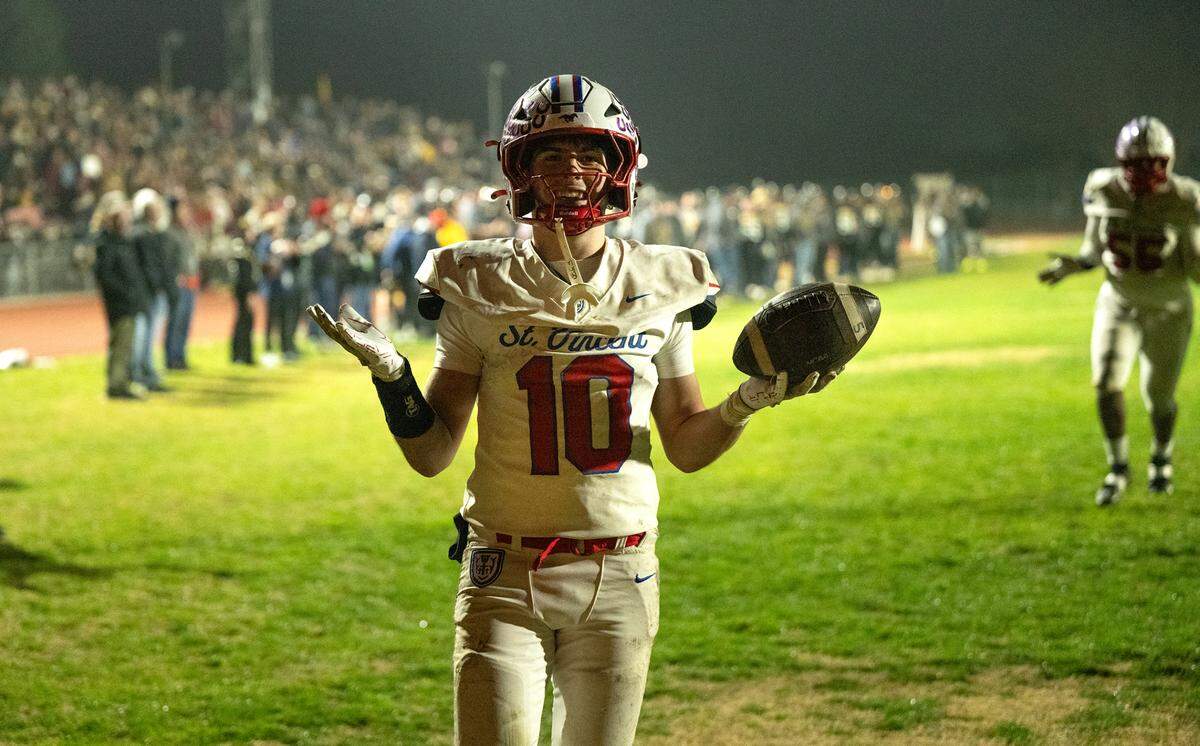 St. Vincent’s Mason Caturegli scored on a run giving the Mustangs a commanding lede over Hughson in the CIF Northern California Division 4-AA Bowl Game in Hughson, Friday, Dec. 6, 2024.