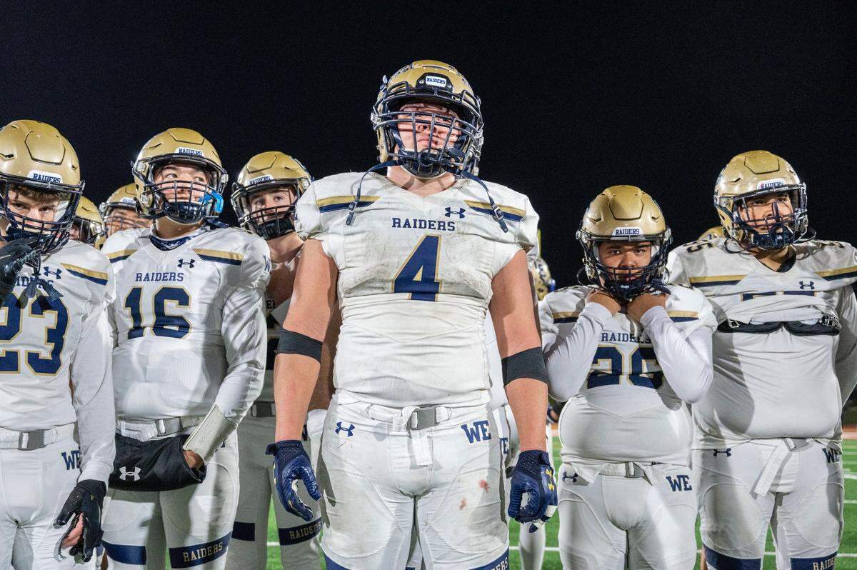 Central Catholic’s Julian Lopez (4) and teammates watch players from Mater Dei Catholic of Chula Vista celebrate after their victory against Central Catholic during the CIF State Division II-AA Championship Saddleback College in Mission Viejo on Friday, Dec. 10, 2021.