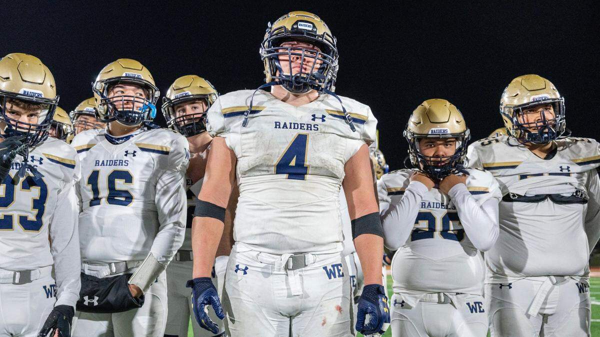 Central Catholic’s Julian Lopez (4) and teammates watch players from Mater Dei Catholic of Chula Vista celebrate after their victory against Central Catholic during the CIF State Division II-AA Championship Saddleback College in Mission Viejo on Friday, Dec. 10, 2021.