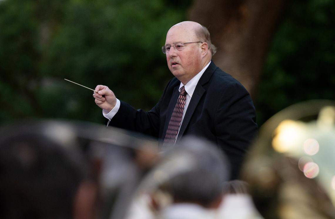 Conductor George Gardner leads MoBand during its first concert of the season at Mancini Bowl in Graceada Park in Modesto, Calif., Thursday, June 8, 2023.