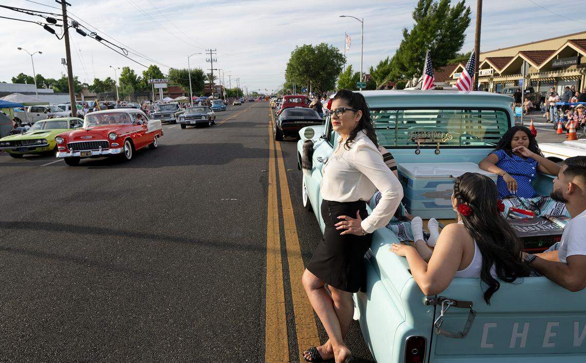 Rosie Solorio waits out gridlock on McHenry Avenue with her family in their 1962 Chevy C10 truck during the Graffiti Parade in Modesto, Calif., Friday, June 9, 2023.