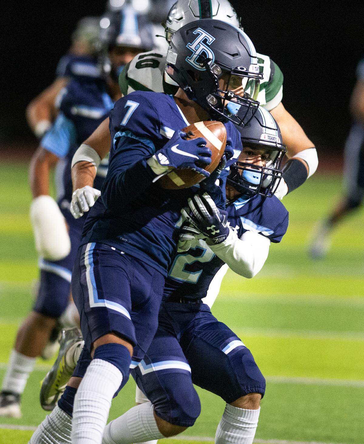 Downey’s Julian Narvaez intercepts a pass during the Central California Athletic League game with Pitman at Downey High School in Modesto, Calif., Friday, Oct. 28, 2022.