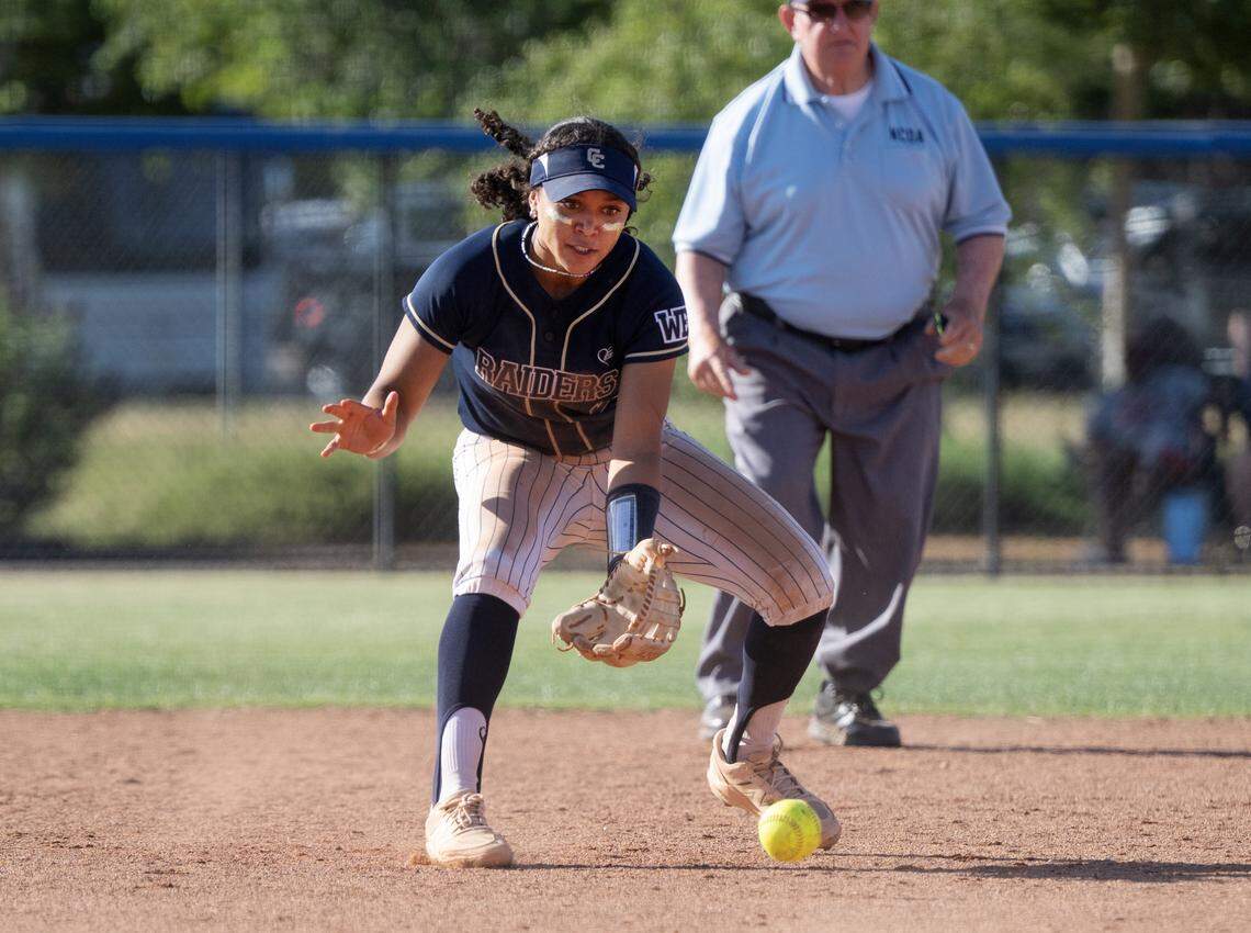 Central Catholic’s Jazmarie Roberts fields a ground ball during the Sac-Joaquin Section Division 3 semifinal playoff game with Manteca at Central Catholic high School in Modesto, Wednesday, May 20, 2025.