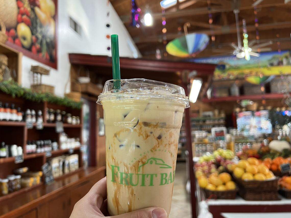 An iced chai oatmilk latte with pumpkin spice syrup, caramel drizzle and cinnamon  at Resendiz Family Fruit Barn in Hughson costs $6.99.