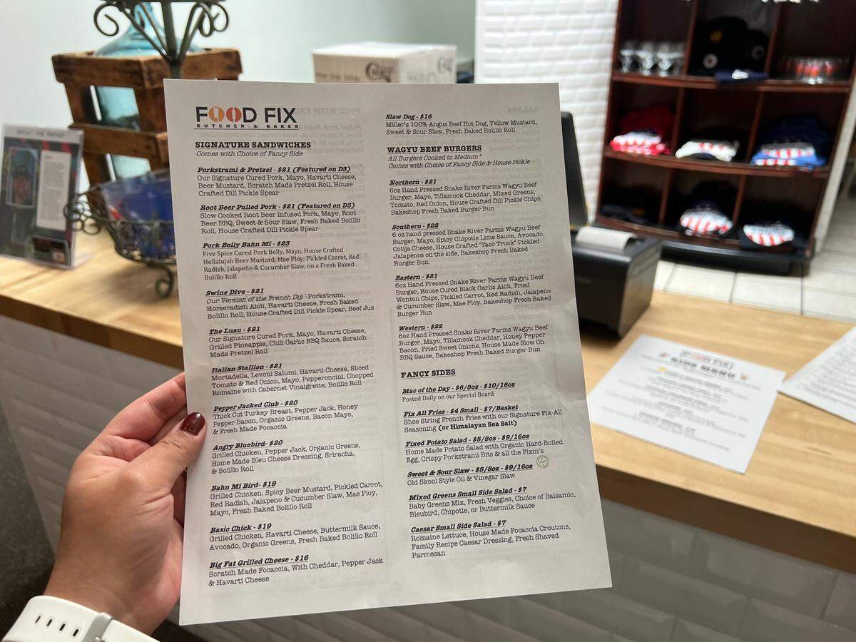 On the menu at Food Fix Butcher and Baker, there are signature sandwiches, ranging in price from $16 to $23.