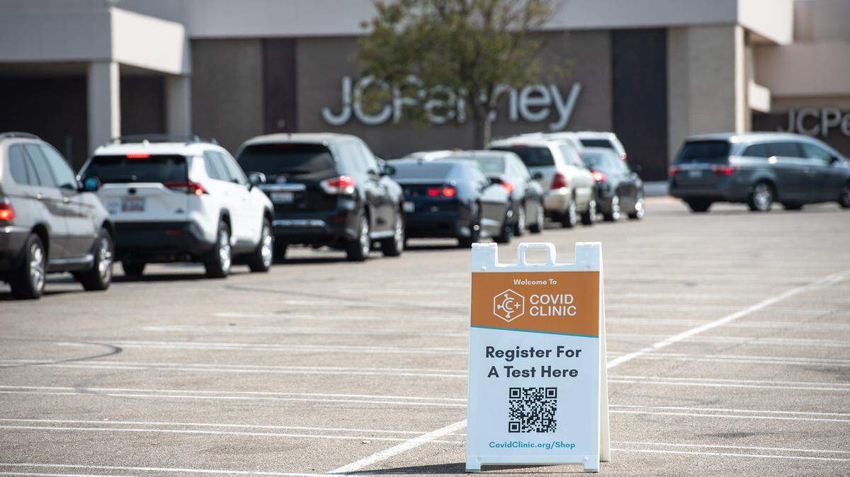 People are tested for COVID-19 at the drive-up Covid Clinic test site at Vintage Faire Mall in Modesto, Calif., on Tuesday, Aug. 24, 2021.
