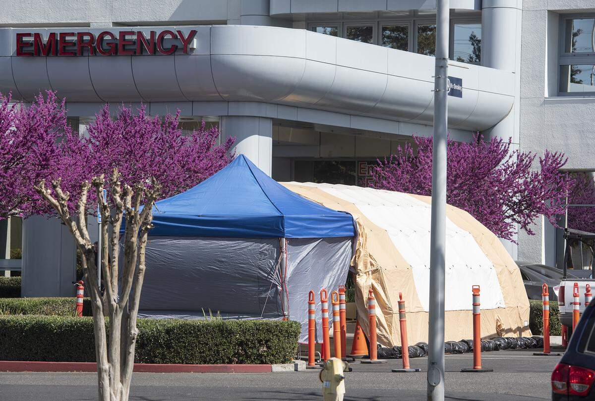 Sutter Memorial Medical Center has set up a tent outside the emergency department in Modesto, Calif., on Friday, March. 13, 2020.