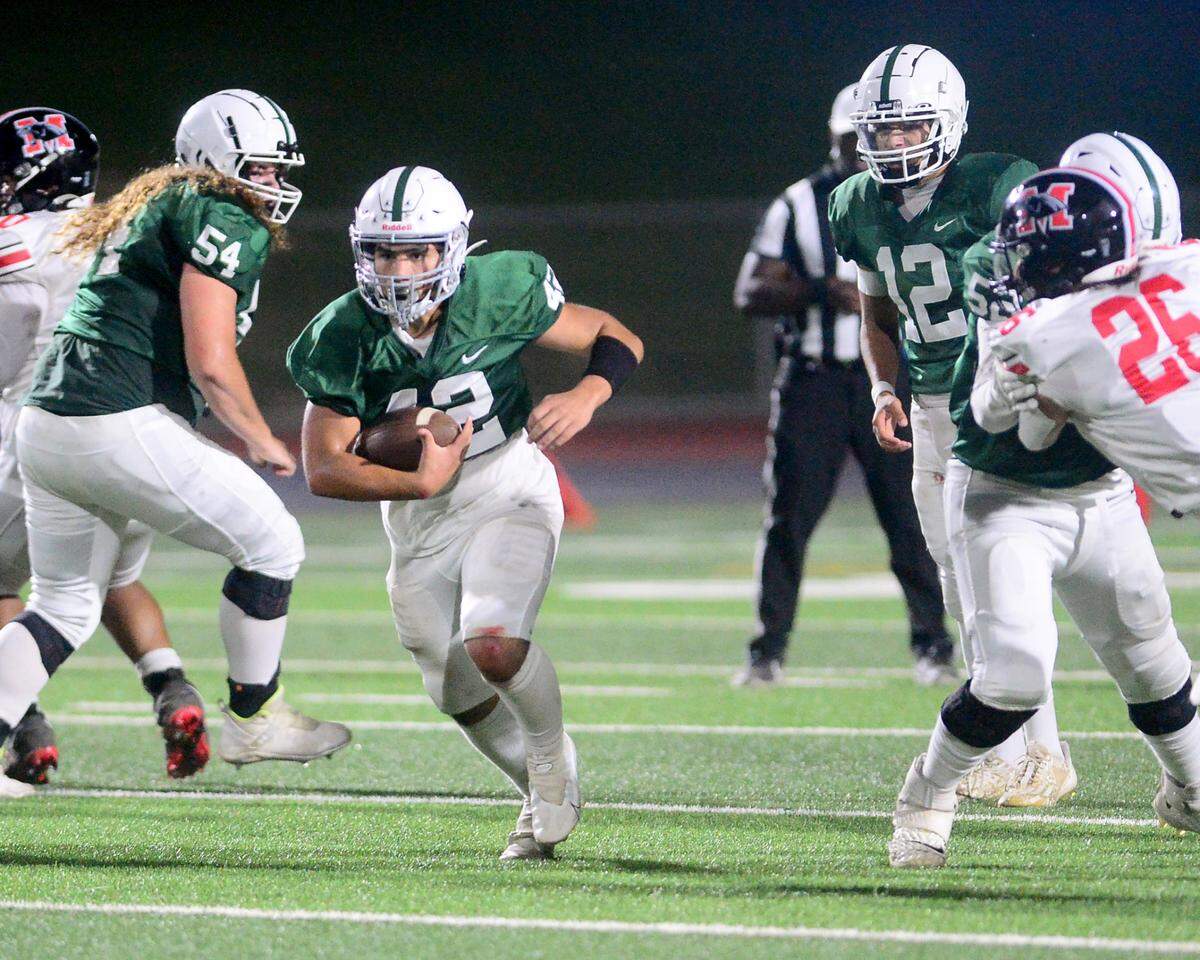 Central Valley running back Emmanuel Luna (42) breaks free on an inside run during a game between Modesto High School and Central Valley High School at Gregori High School in Modesto, Calif., on Sept. 13, 2024.