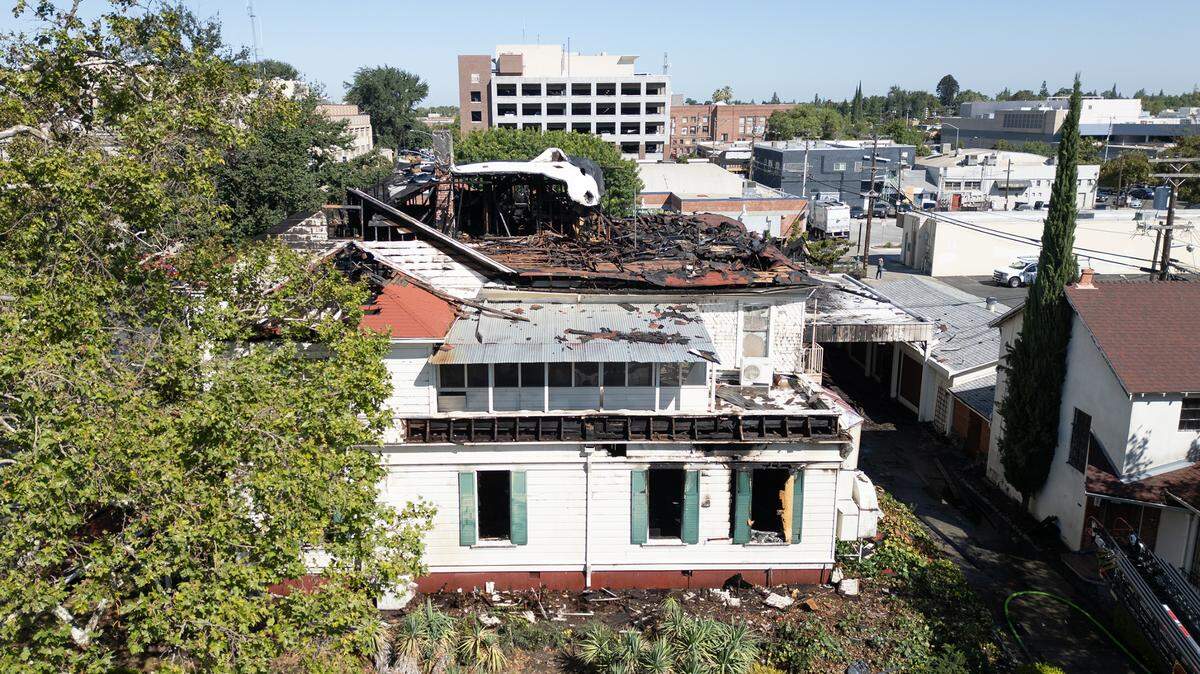 The former Franklin and Downs Funeral Homes building at 12th and G streets was damaged by an early morning fire in Modesto, Calif., Tuesday, July 16, 2024.
