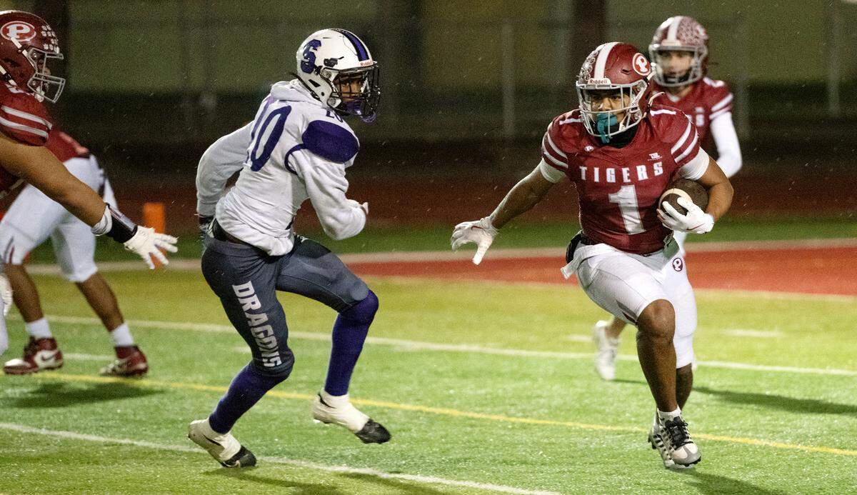 Patterson’s Jeremiah Lugo ran for two touchdowns in the Sac-Joaquin Section Division IV semifinal game with Sacramento at Patterson High School in Patterson, Friday, Nov. 22, 2024. Patterson won the game 21-12.