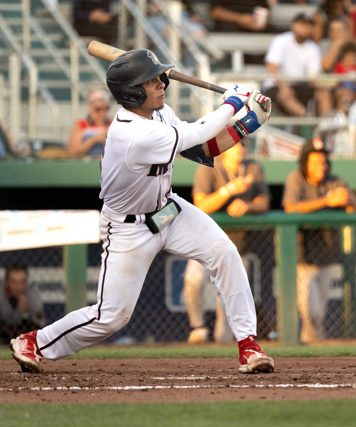 Modesto’s Jacob Sharp hits a RBI single during the game with Fresno at John Thurman Field, Calif., Wednesday, July 3, 2024. Modesto won the game 6-3.