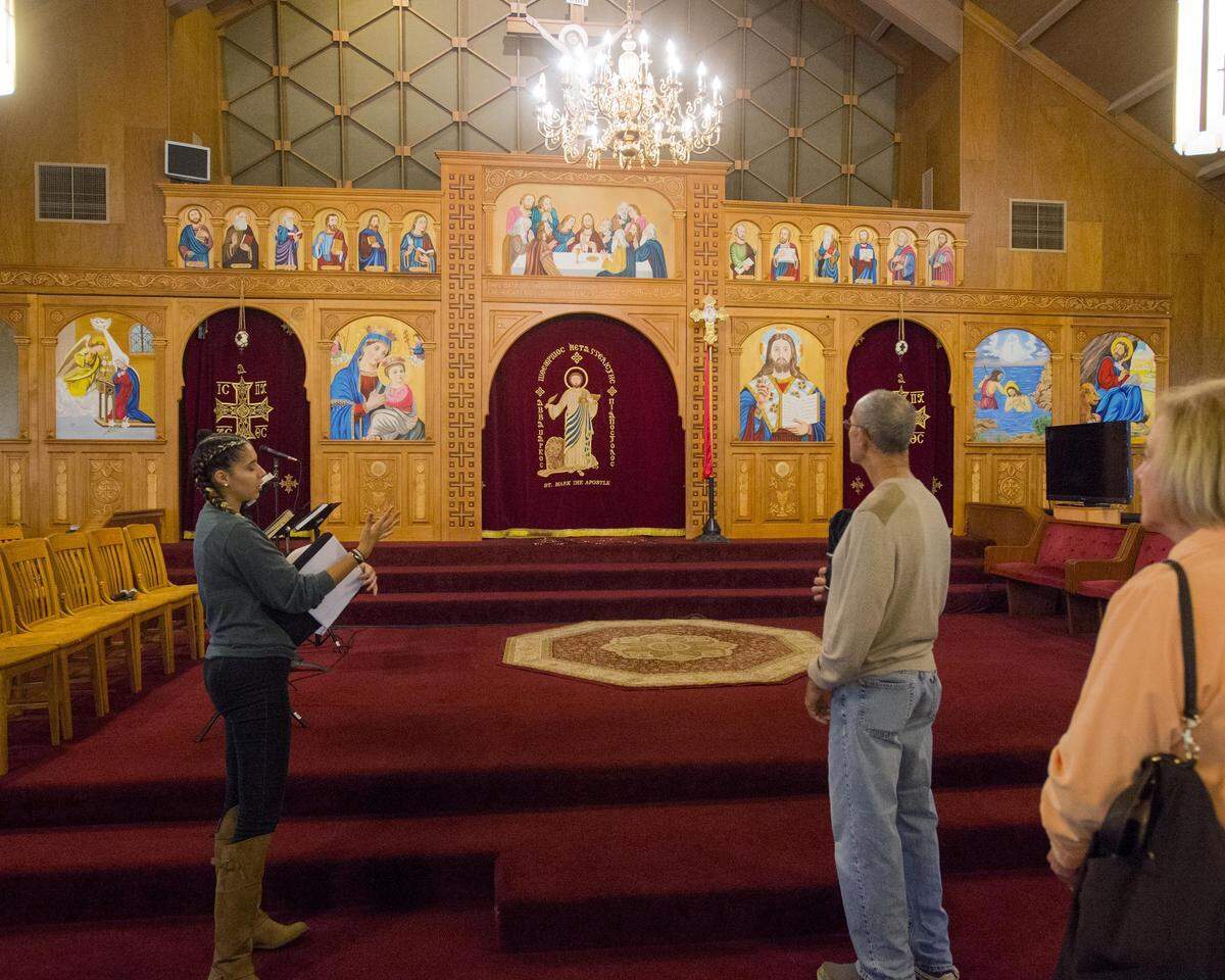 Rita Gouda (left) leads a tour of St. Mark Copic Orthodox Church during the Egyptian Festival at St. Mark Coptic Orthodox Church in Ripon California on October 15, 2016.