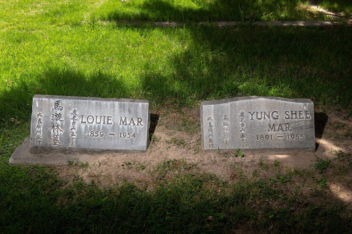 Grave sites of Louie Mar and his wife Yung Shee Mar at the Modesto Citizens Cemetery in Modesto, Calif., on Wednesday, May 25, 2022.