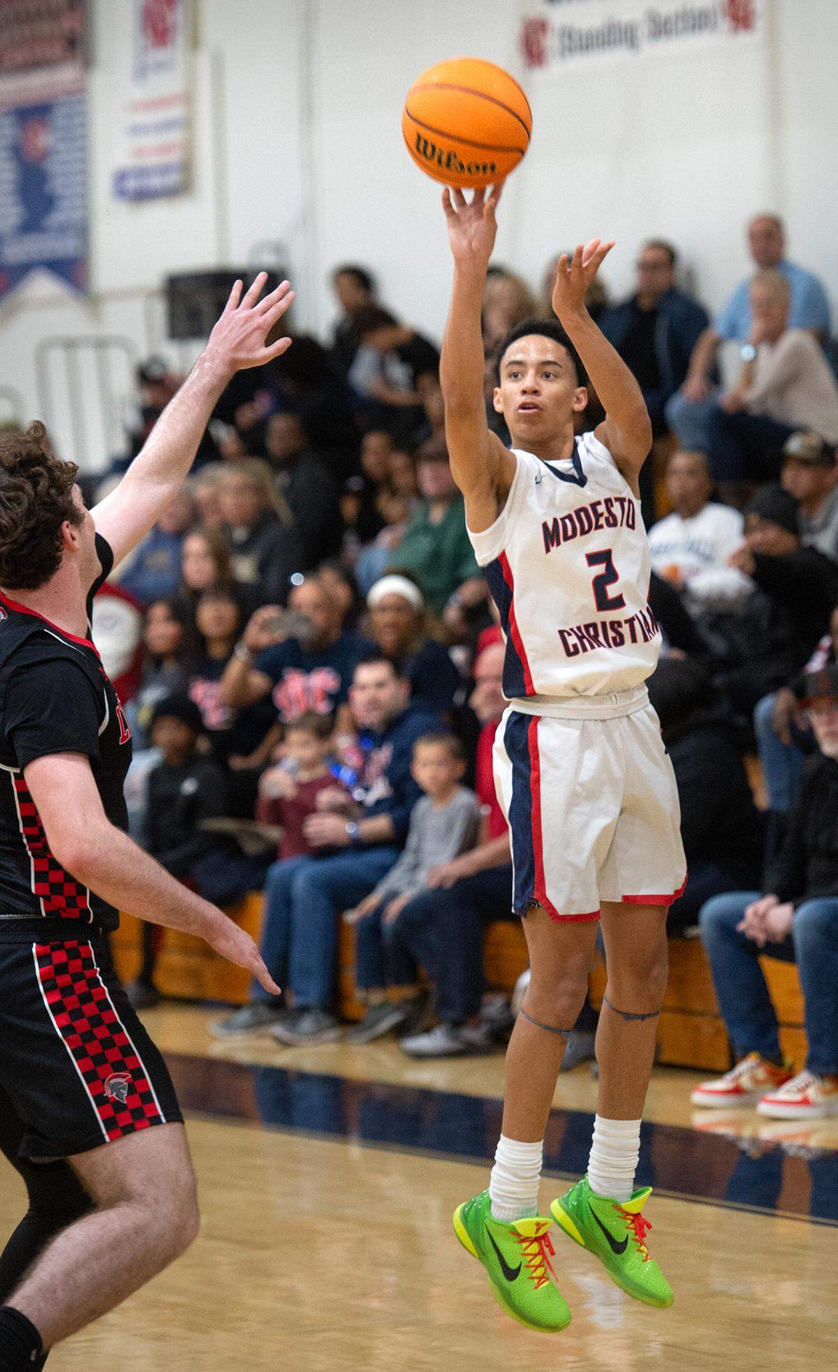 Modesto Christian’s Rashod Cotton scores on a jumpshot during the Sac-Joaquin Section Division I playoff game with Lincoln at Modesto Christian High School in Salida, Calif., Friday, Feb. 17, 2023.