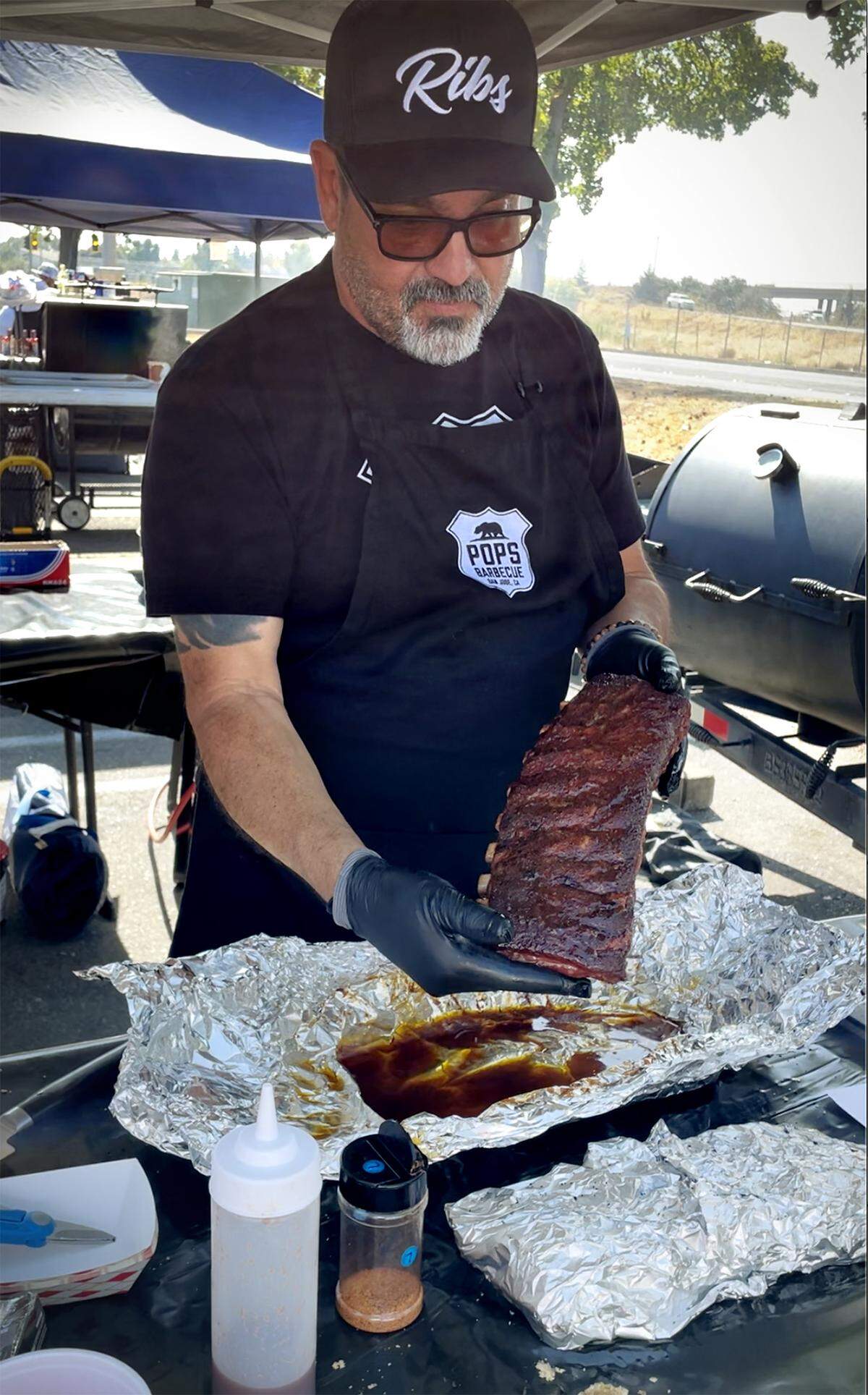 The Los Mexi”Q”tioners team shows its ribs at the barbecue competition at Famous Dave’s restaurant in Modesto on  Saturday, Sept. 6, 2025.