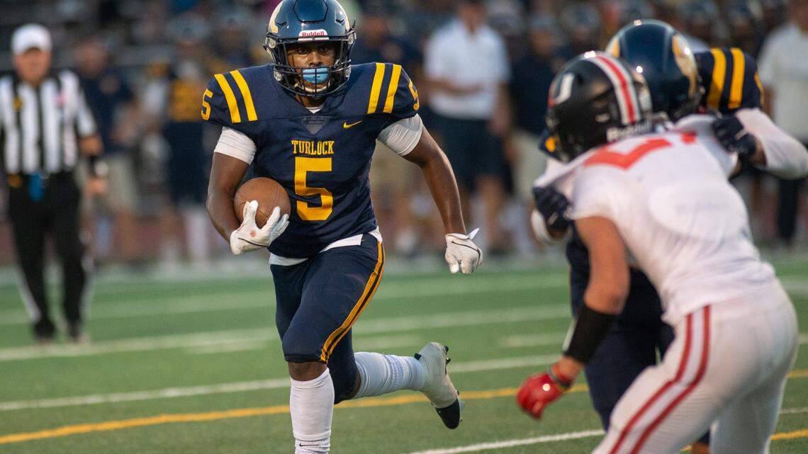 Turlock’s Jamel Foreman runs for a fourth quarter touchdown during the non-league game with Clayton Valley Charter at Turlock High School in Turlock, Calif., on Monday, Aug. 30, 2021.