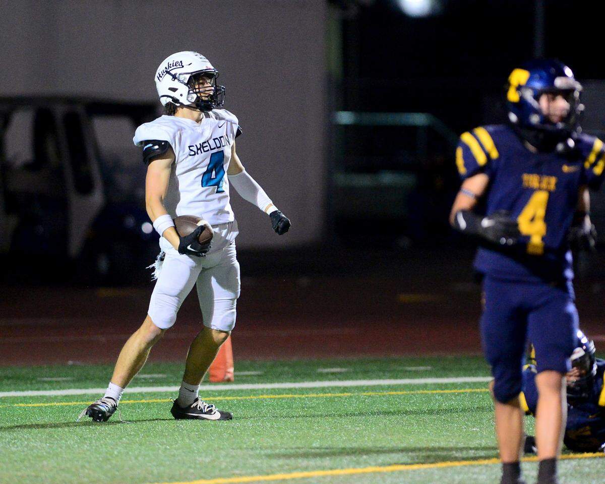 Sheldon receiver Brandon Acker (4) celebrates after catching a touchdown during a CIF Sac-Joaquin Section Football Division I playoff game between Turlock high School and Sheldon High School at Turlock High School in Turlock, California on Nov. 3, 2023.