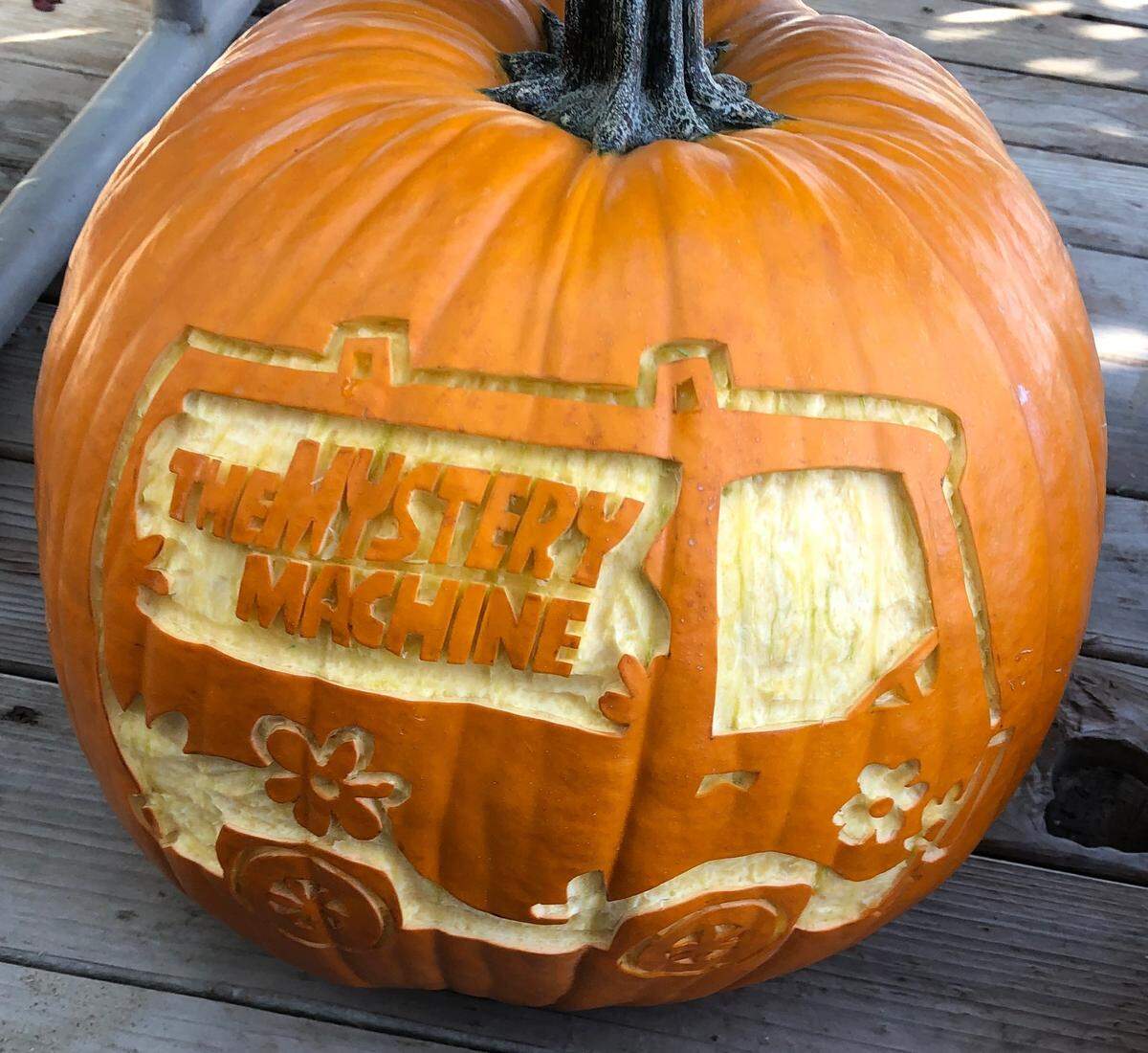 The Mystery Machine, carved in relief, is among the Scooby-Doo designs on jack-o’-lanterns being made by Tami Munns and Gina Bruederle and their families and friends in Oakdale CA