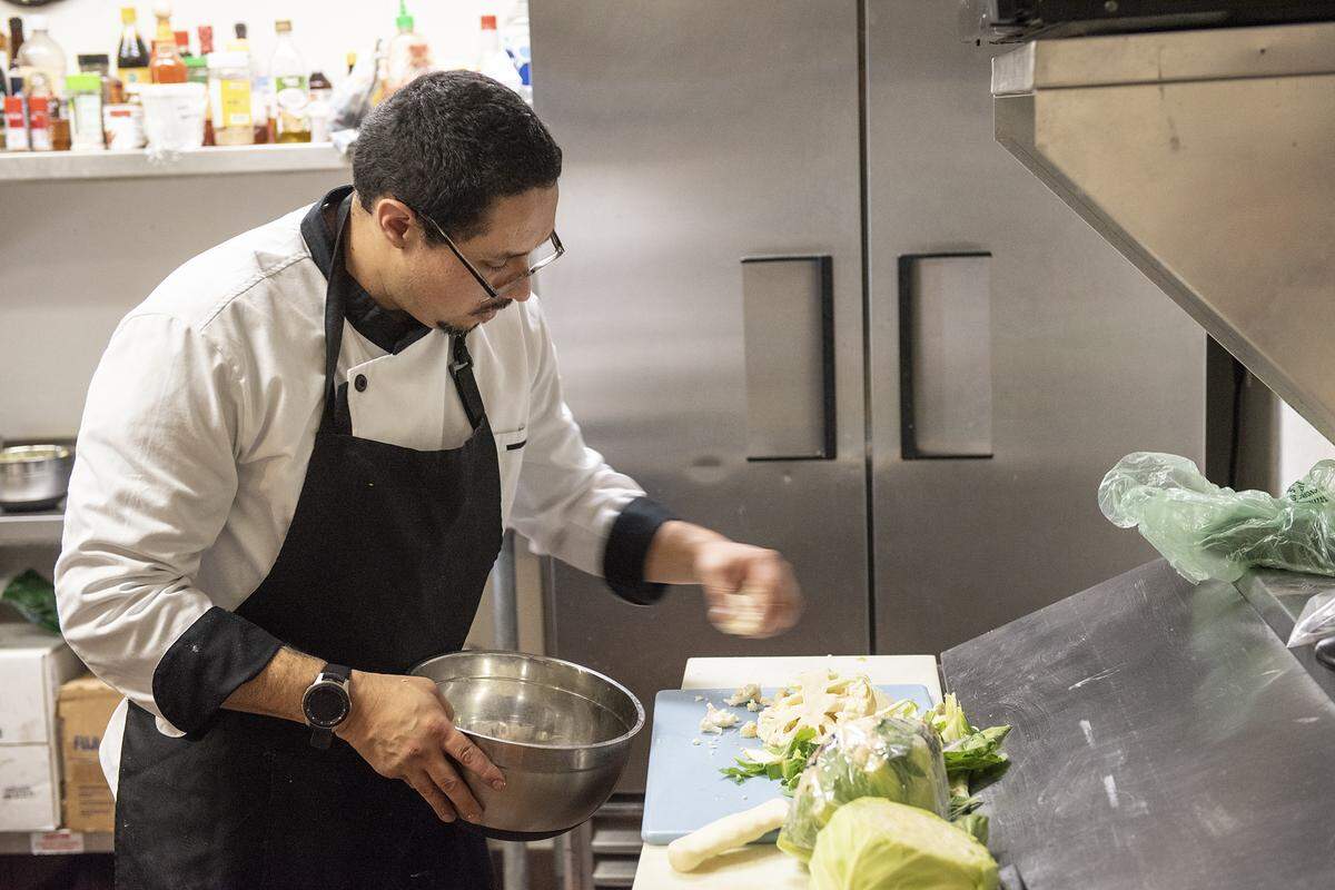 Chef and owner David Salazar works in the kitchen at Yūgo Sushi Bistro in Riverbank, Calif., on Friday, Jan. 3, 2020.