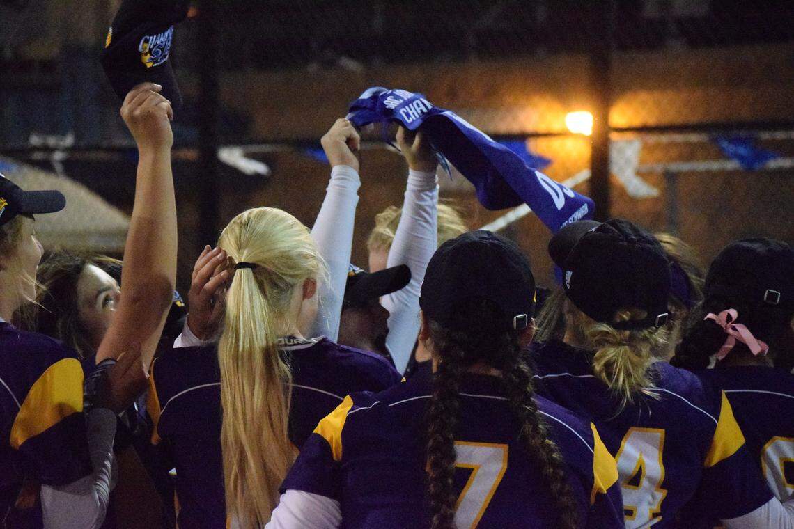 Escalon softball team celebrates after winning its third straight CIF Sac-Joaquin Section title with a 11-6 win over Linden in the Division V Championship on Tuesday, May 21, 2019 at the Arnaiz Softball Complex in Stockton, California.