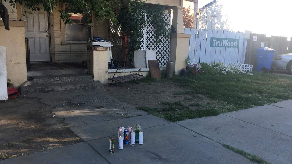 A small memorial has been placed in front of the residence on the 300 block of Mitchell Avenue in Turlock where a 17-year old boy died after being shot Monday evening. 