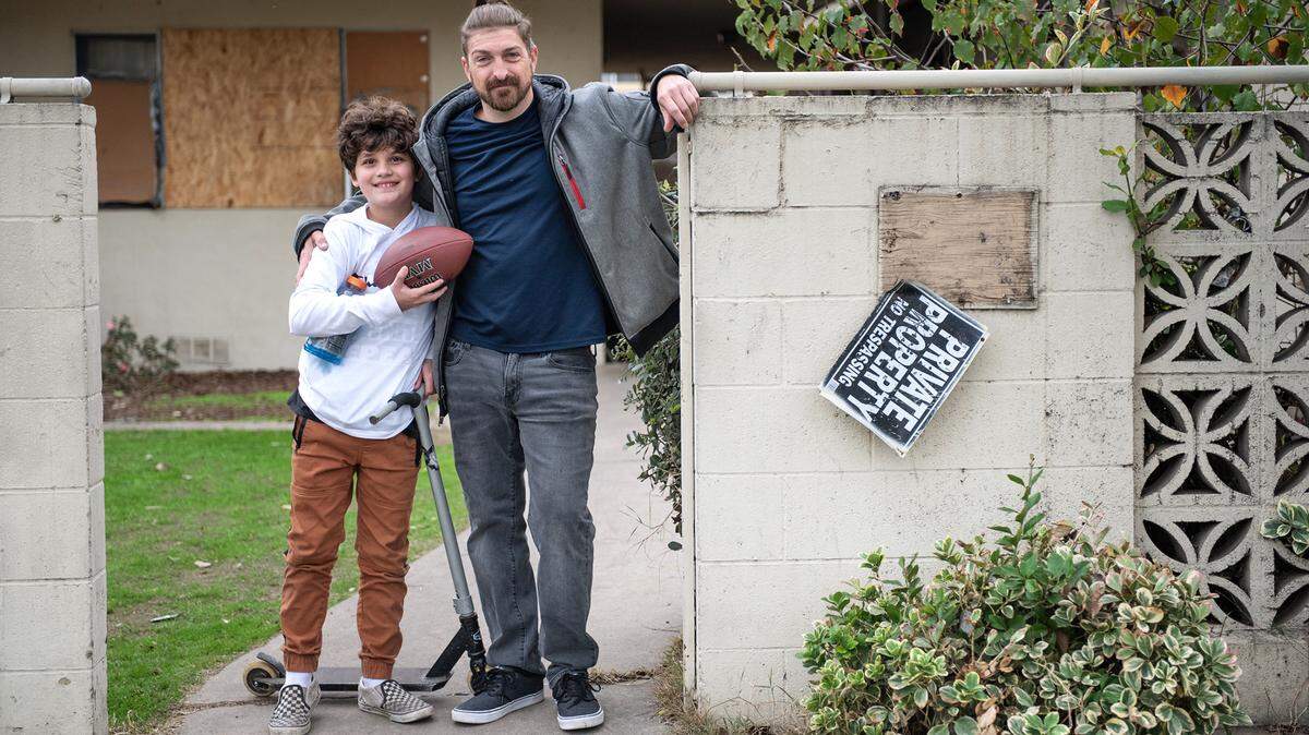 Johnathan Uhl with his son Erick Baumgarte, 10, at their apartment complex in Modesto, Calif., on Thursday, Jan. 21, 2021. Modesto expects to receive $5 million to $7 million from the federal government to help low-income renters stay in their homes.