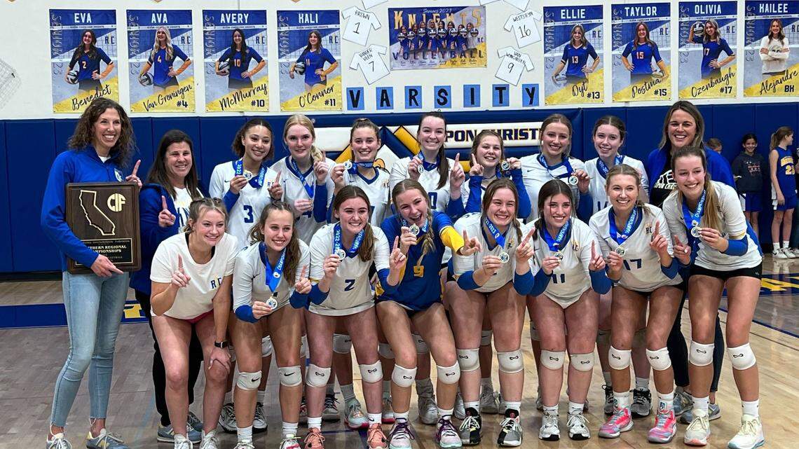 The Ripon Christian High volleyball team poses with the Division IV Northern California Regional Champions plaque after defeating Head-Royce 3-1 on Tuesday, Nov. 15, 2022.