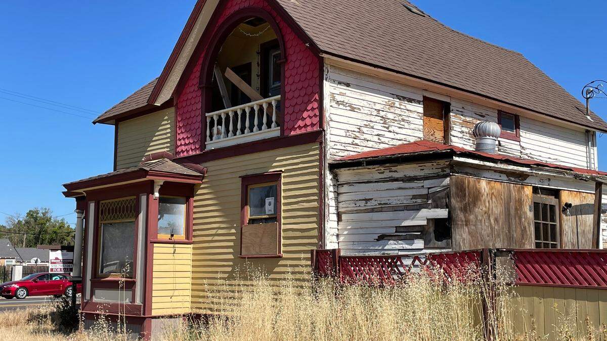 The Queen Anne Victorian-style home up for sale at Tully and Orangeburg in Modesto has seen better days.