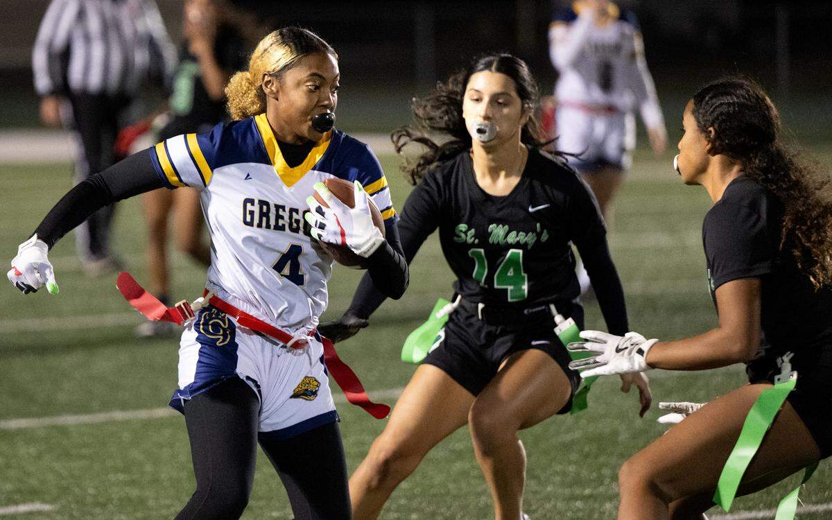 Gregori’s Veronica Whitten runs the ball after a catch during the Sac-Joaquin Section playoff game with at St. Mary’s High School in Stockton, Tuesday, Oct. 29, 2024.