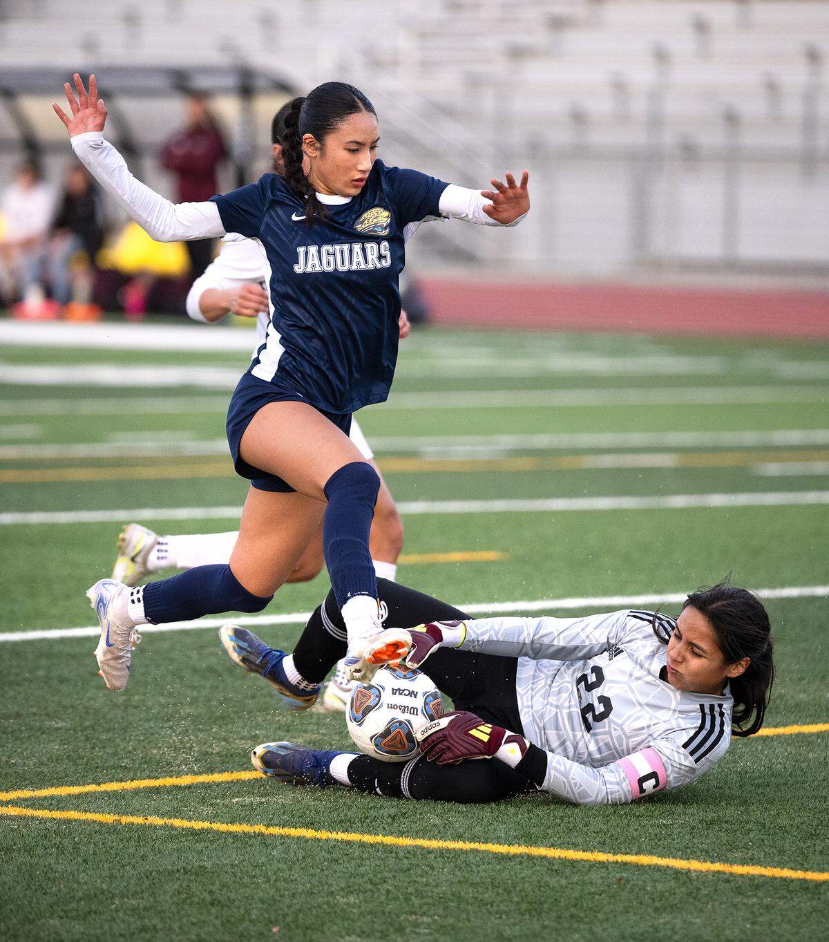 Central Valley goalie Magnolia Tavizon secures the ball under pressure from Gregori’s Grace Rodriguez during the Sac-Joaquin section playoff match at Gregori High School in Modesto, Tuesday, Feb. 18, 2025.
