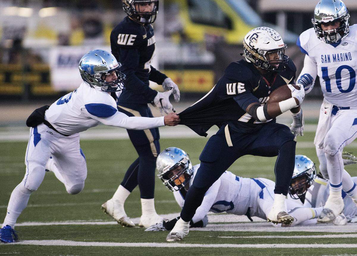 Central Catholic running back Montell Bland runs the ball during the CIF Open Division Small School championship with San Marino at California State University, Sacramento, on Dec. 19, 2015.