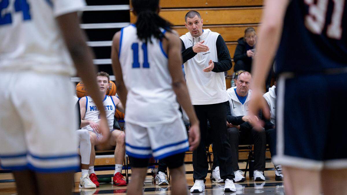 Modesto head coach Brice Fantazia gives direction to his players during the Big 8 Conference game with American River College at Modesto Junior College in Modesto, Thursday, Feb. 13, 2025.