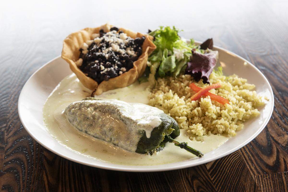 Jesse’s Favorite (stuffed Pasilla pepper with cheese and ground beef in a green cream relent sauce) at Primos Restaurant and Tequila Bar in Ripon, Calif., on Tuesday, Jan. 7, 2020.