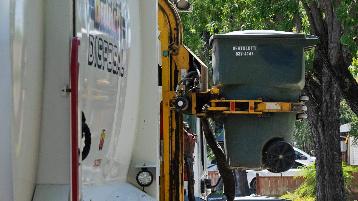 Bertolotti Disposal picks up garbage on Boyce Lane in Modesto, Calif., Friday, August 4, 2023.