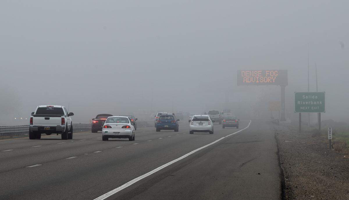 Drivers on Highway 99 are alerted about adverse weather in Salida, Calif., Sunday, Dec. 25, 2022.  